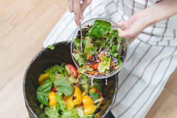 Food waste environment concept, people throwing food garbage into bin prepare to decompose.