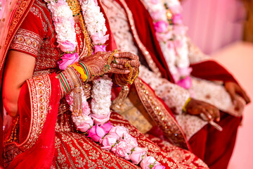 Fototapeta na wymiar Indian Hindu wedding ceremony rituals hands close up