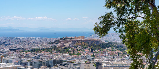 Obraz premium Greece Acropolis city of Athens parthenon, symbol of ancient, panorama of residential buildings at sunrise summer. World Heritage sites.