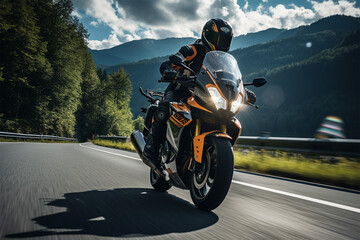 Obraz premium Motorcycle driver on an Alpine freeway