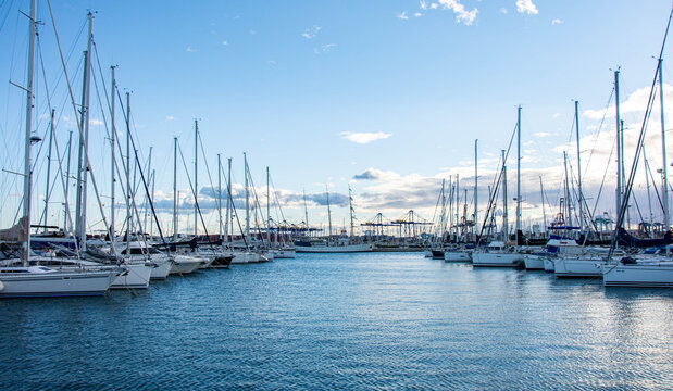 VALENCIA , SPAIN - DECEMBER 6, 2021: Yachts and boats in Valencia marina - Powered by Adobe