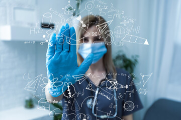 science, research and chemistry concept - young scientist in safety glasses with test tube and virtual projection of chemical formula.