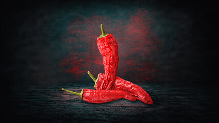 Red pepper. Red dry chili pepper on abstract grunge background