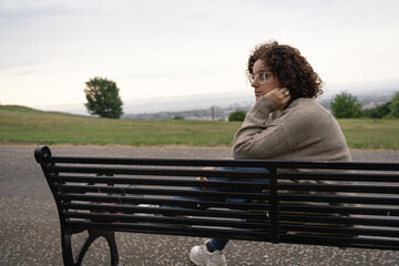 Woman sitting on a bench