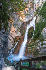 Golden Dreams Unveiled: Sunset's Embrace Illuminates Savica Waterfall's Majestic Cascades.