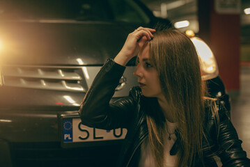 resting girl in the parking lot
