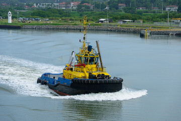 Tugboat near Bridge of the Americas on the Panama canal