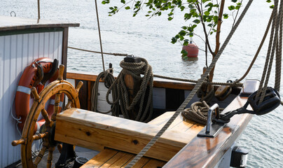Details of an old wooden schooner in the archipelago in midsummer