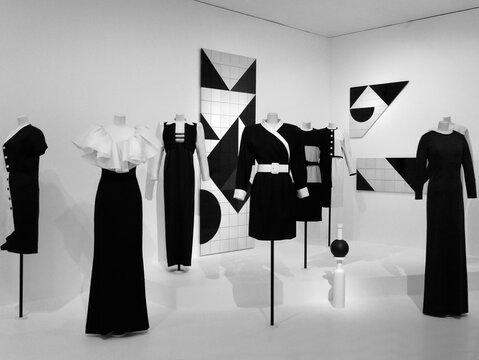 Yves Saint Laurent, french haute couture, Paris, "shapes" : clean-lined black and white garments set against a backdrop by Claudia Wieser