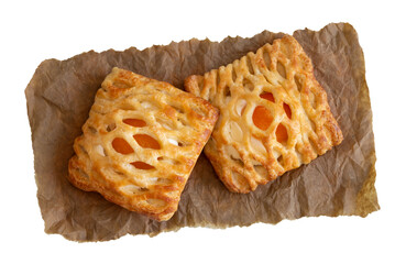 Puff pastry with fruit filling decorated with mesh on top. View from above