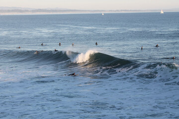 Fototapeta premium Surfers on the ocean in Santa Cruz California