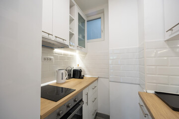 Small kitchen interior with appliances