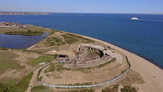 Gilkicker Fort a Palmerston Fort built between 1863 to 1871 on the Eastern end of Stokes by in Gosport to protect the entrance to Portsmouth harbour, aerial footage.