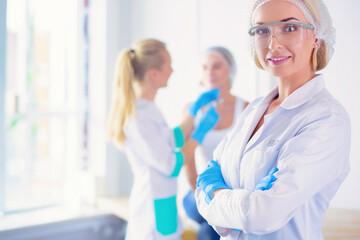 Beautiful woman face near doctor with syringe.