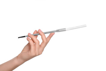 Woman holding long cigarette holder isolated on white, closeup
