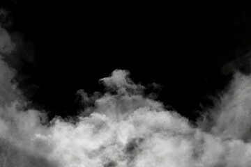 Cloud of white smoke on black background