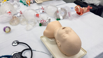 Hospital airway kit signifies emergency airway management. Endotracheal tube, supraglottic airway, laryngoscope, and Ambu bag symbolize crucial interventions for respiratory support