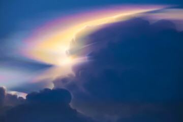 Iridescent Pileus Cloud on the sky.