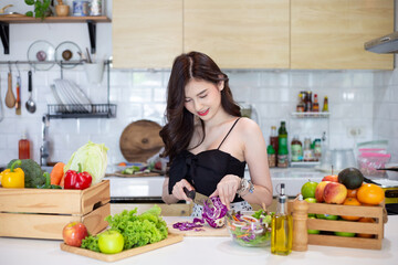 Beautiful Asian Woman smiling preparing vegetable salad in the kitchen Healthy FoodsVegan SaladsVegetarian SaladFood IdeasDiet IdeasHealthy LifestyleCooking At Home