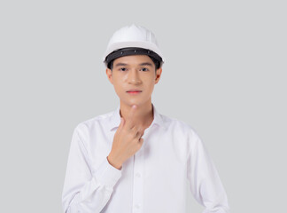 Portrait young asian engineer man wearing helmet thinking idea isolated white background, architect or contractor with planning and thoughtful, contractor consider with solution, industrial concept.
