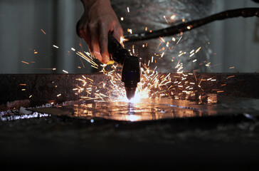 Cutting metal plate with a laser. cutting metal