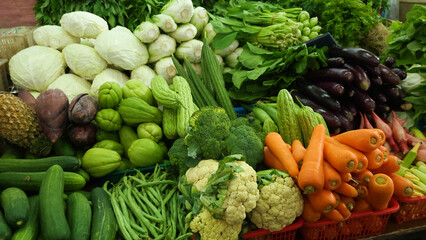 Fresh vegetables displayed in Indonesian traditional market.