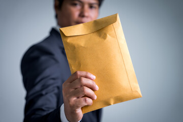 Being arrested for breaking the law, Businessman with brown money envelope, demanding bribes for...