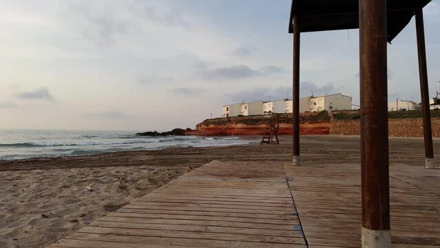 La Cala Estaca in Playa Flamenca, Orihuela Costa, Costa Blanca, Spain. A nice little beach filmed during sunrise in June.