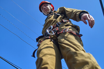 A specialist is repairing the roof. Rope access	