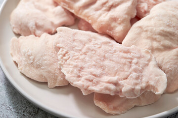 frozen chicken breast on a plate