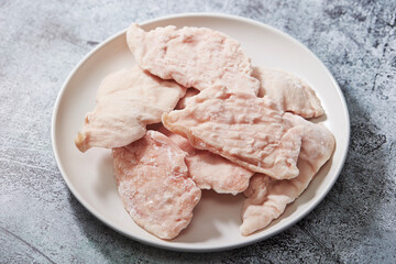 frozen chicken breast on a plate