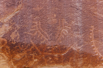 Petroglyph Panels in Capitol Reef National Park near Fruita, Utah during spring. Selective focus, background blur and foreground blur. 
