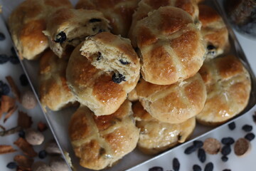 Hot cross buns. A sweet fruit bun lightly spiced with cinnamon and nutmeg and marked with a cross...