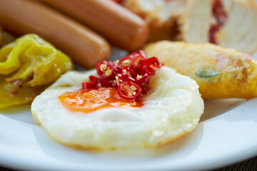 Salad with Boiled Sausage and Fried Egg