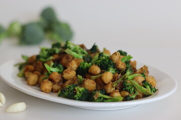 Chickpea broccoli stir fried. Garlic and broccolis stir fried with chickpeas
