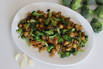 Chickpea broccoli stir fried. Garlic and broccolis stir fried with chickpeas