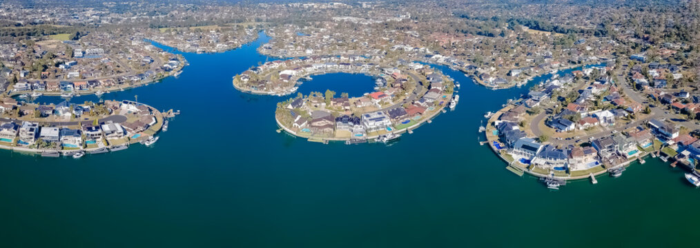 Panoramic aerial drone view above Sylvania Waters in the Sutherland Shire, Sydney, Australia on a sunny day in June 2023 