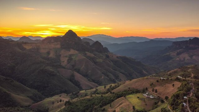 Aerial video from a drone shows high mountains and a beautiful sky at a sunset view point in Kikkokho, Mae Hong Son, Thailand.