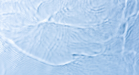 Fototapeta na wymiar transparent blue clear water or wavy water texture background