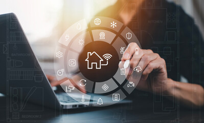 Hand using AI smart tablet with smart home app on the room, circular interface of the smart home automation assistant on the virtual screen and user touches the button, smart home digital interface