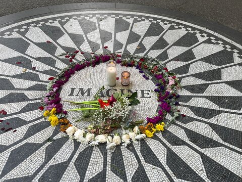 Stone mosaic inlay design with the inscription "IMAGINE", at the Strawberry Fields memorial to British musician and peace activist John Lennon, on June 19, 2023 in Central Park in New York, New York.

