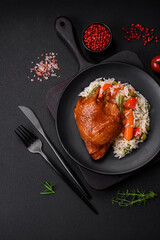 Delicious boiled rice with chicken and vegetables or risotto with salt, spices and herbs