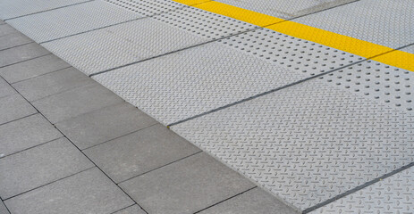 Tactile Paving on Modern Tiles Pathway for Blind Handicap, Safety Sidewalk Walkway for Disability...