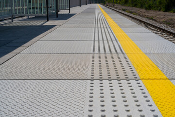 Tactile Paving on Modern Tiles Pathway for Blind Handicap, Safety Sidewalk Walkway for Disability...
