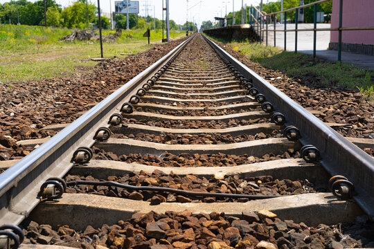 Railway Lines Closeup, Train Tracks with Track Ballast Stones, Metal Rails, Old Railway Track
