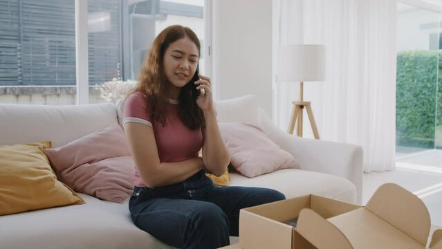 Upset asia people young Gen Z anger argue fight phone call on damage post mail box buy at home online shop retail store. Shock sad rude woman unbox wrong product order bad shipping CRM buyer service.