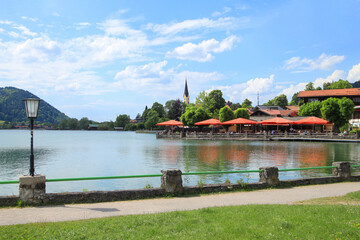 Beautiful view in summer to Schliersee with the beach promenade in Bavaria - Germany