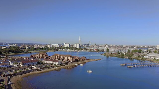 Aerial over Haslar lake in Gosport towards Haslar Marina and Portsmouth,