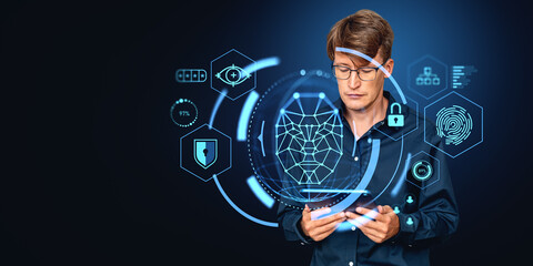 Businessman with tablet in hands, biometric scanning and digital hologram