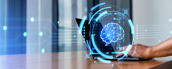 Man hands typing on laptop with AI brain interface